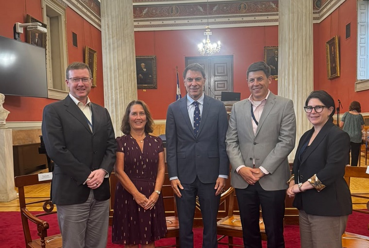 Five people smiling